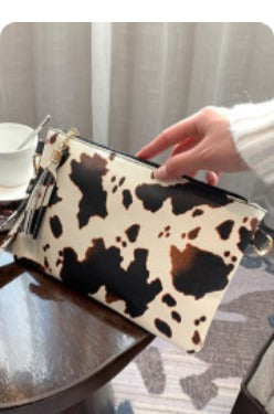 White Leopard Cow Print Wristlet